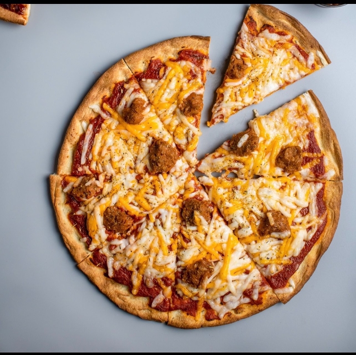 FAB'S ITALIAN VEGAN SAUSAGE PIZZA.