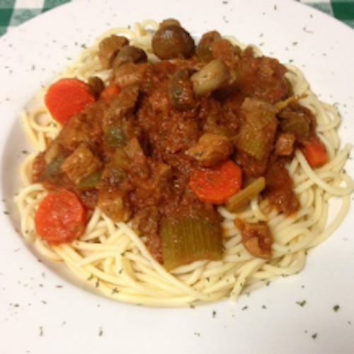 Veal Scallopini Over Spaghetti.