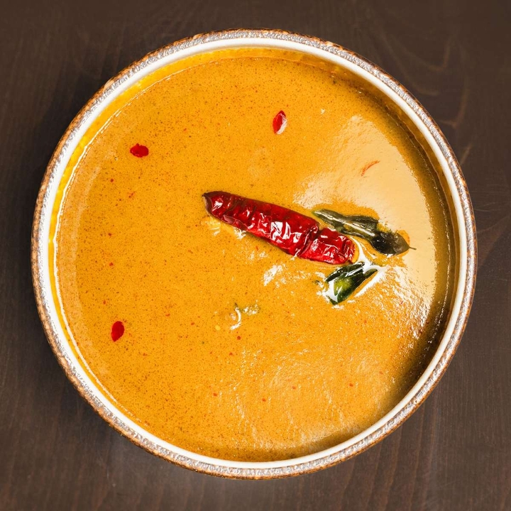 Varutharacha Chicken Curry.