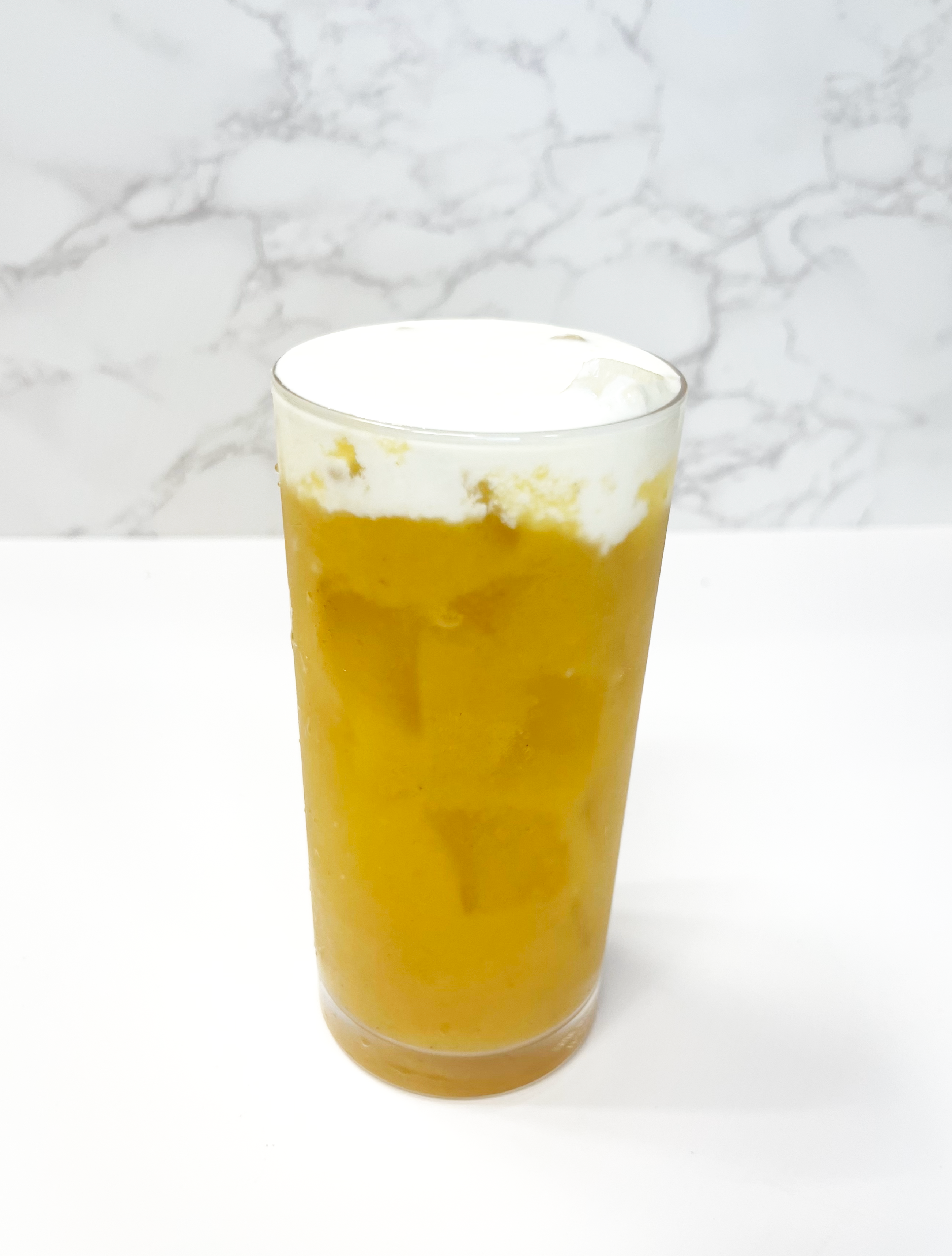 Pineapple Green Tea w/sweet cream.