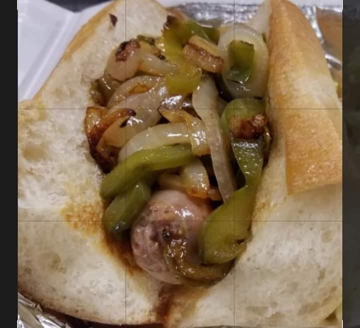 SAUSAGE W/ PEPPERS & ONIONS GRINDER.
