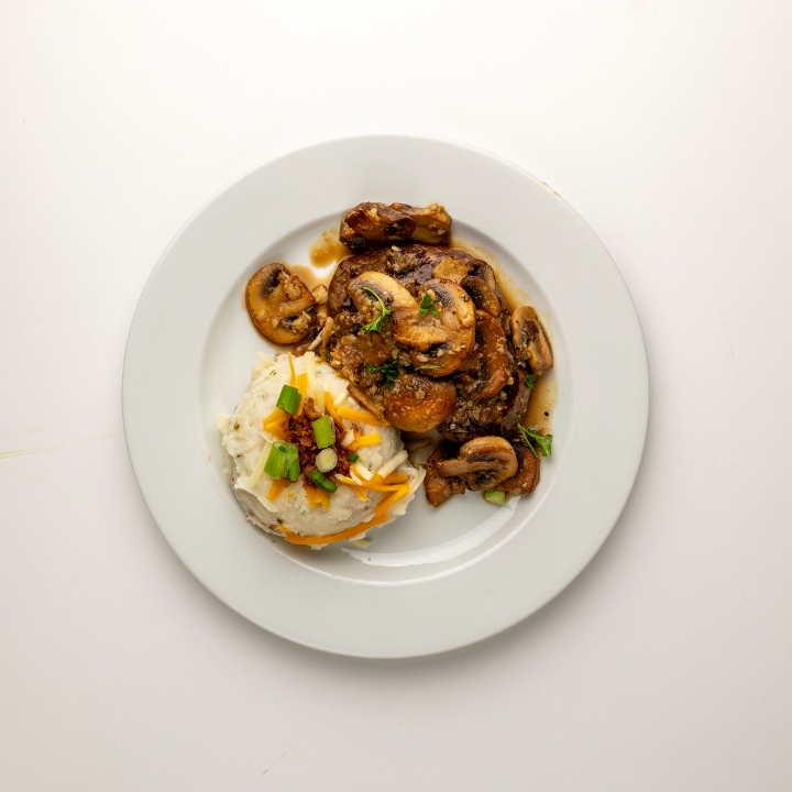 Sirloin Steak with Roasted Garlic & Mushroom au jus.