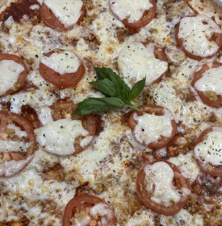 Tomato Mozz Pizza *.