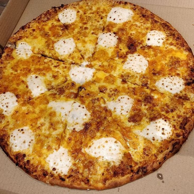 Seven Cheese Specialty Pizza.