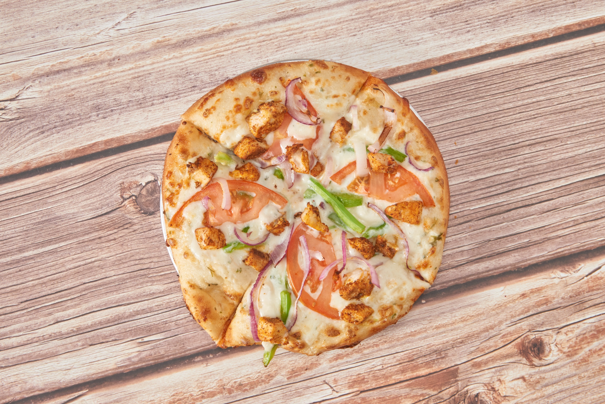 The Tandoori Italiano Pizza.