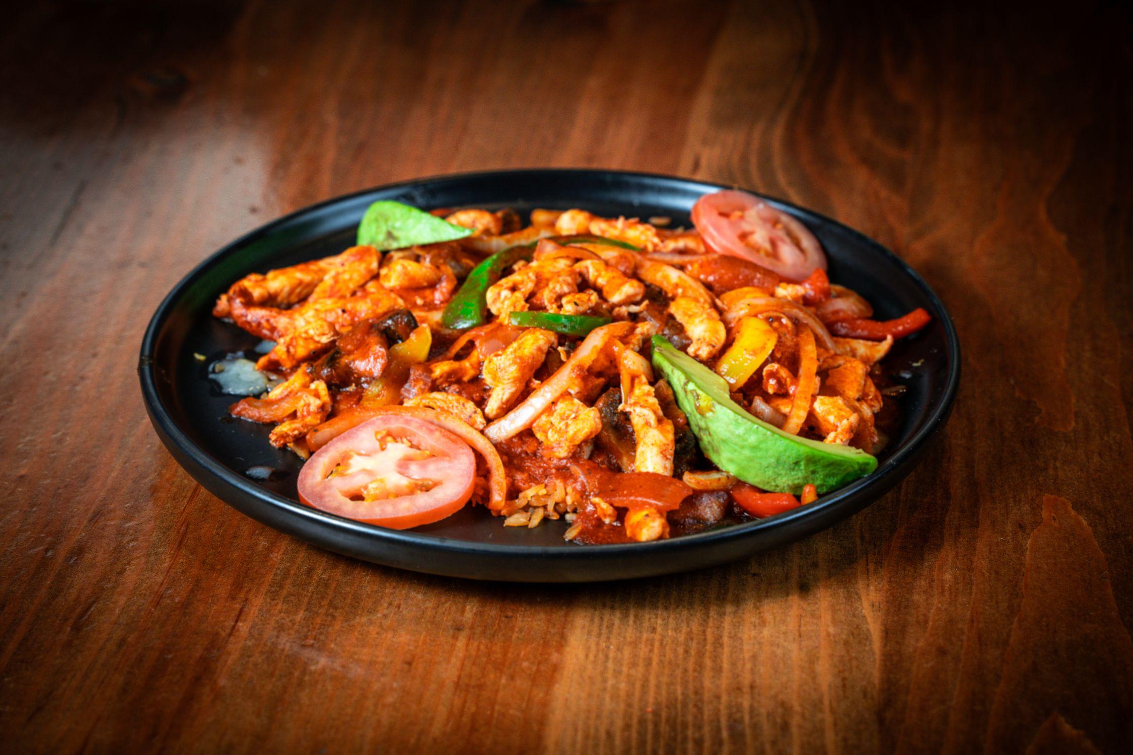 L-Arroz Con Pollo.