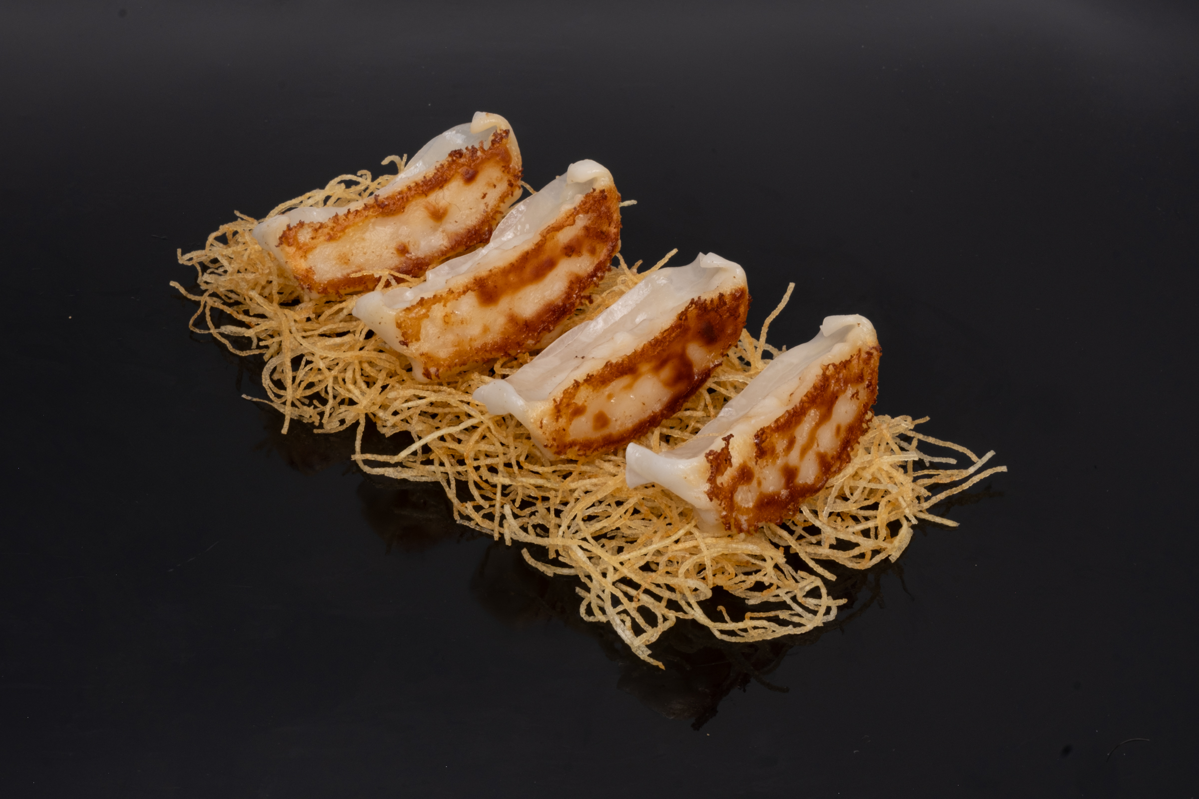 Gyoza (Chicken - 4 pieces).