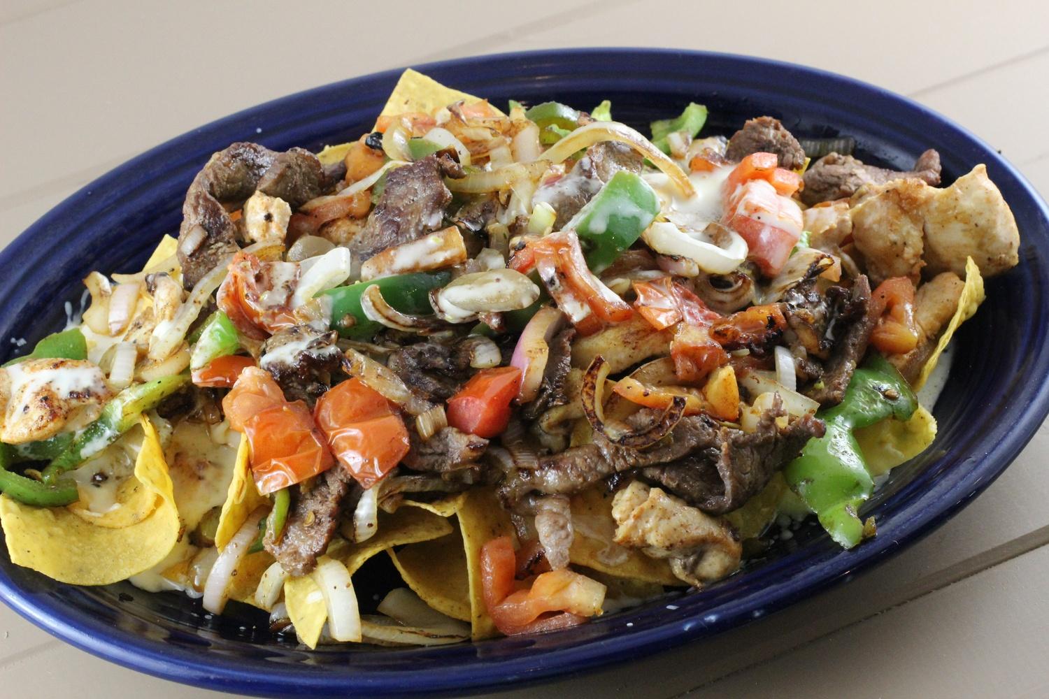 Nachos Fajita Steak and Chicken.