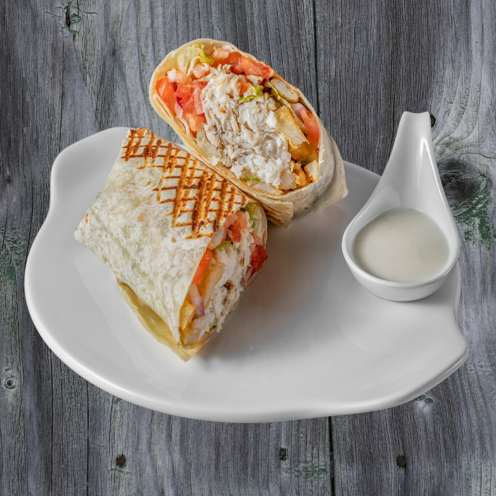 Tilapia With Tartar Sauce On The Side.