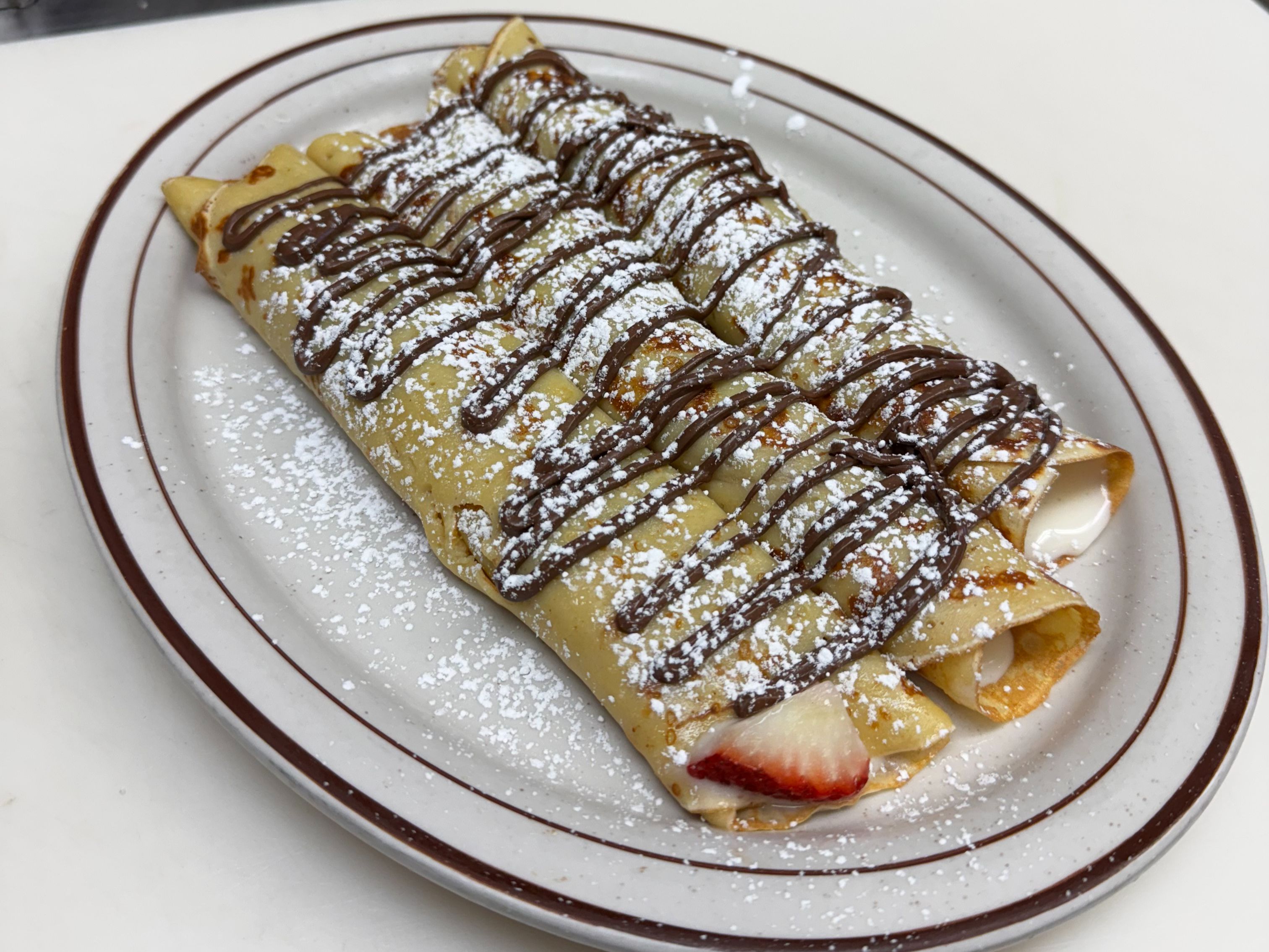 Strawberries & Cream Crepes.