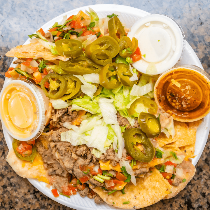 Nachos Full With No Queso Sauce.