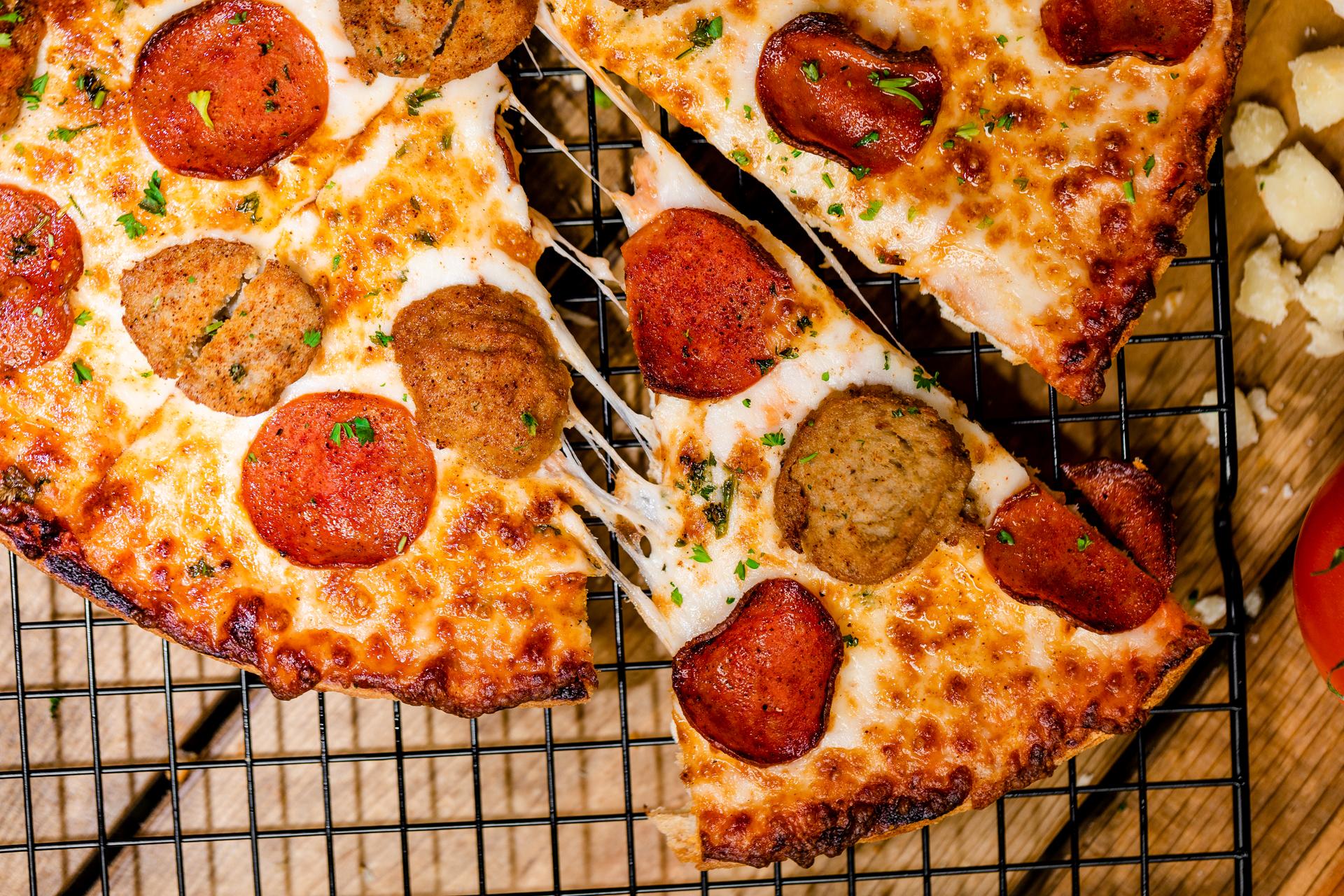 Turkey Pepperoni & Chicken Sausage Pizza.