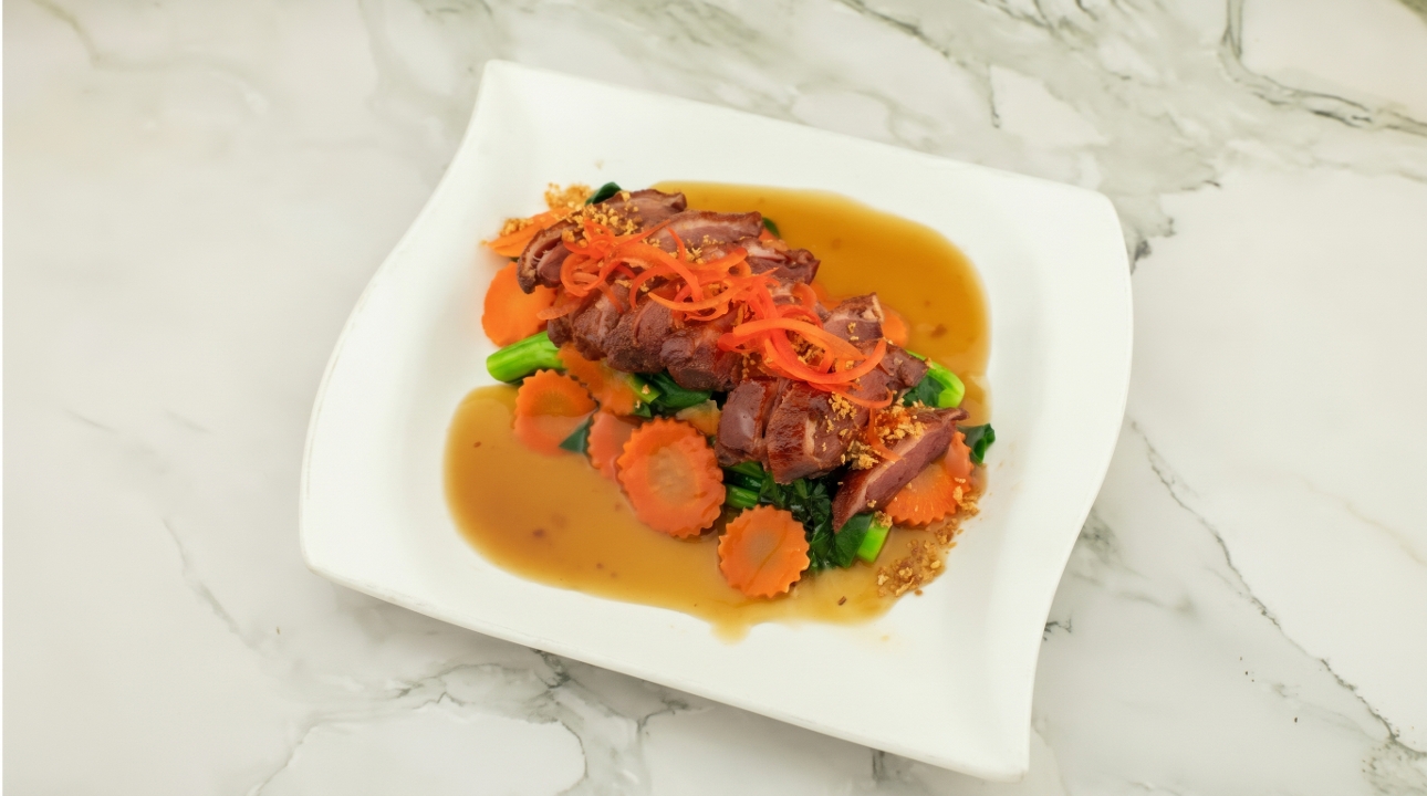E5 Duck Breast with Tamarind Honey Glaze.