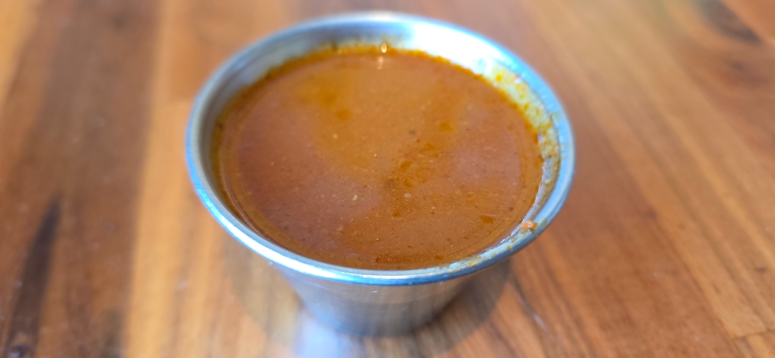 Side of Red enchilada Sauce.