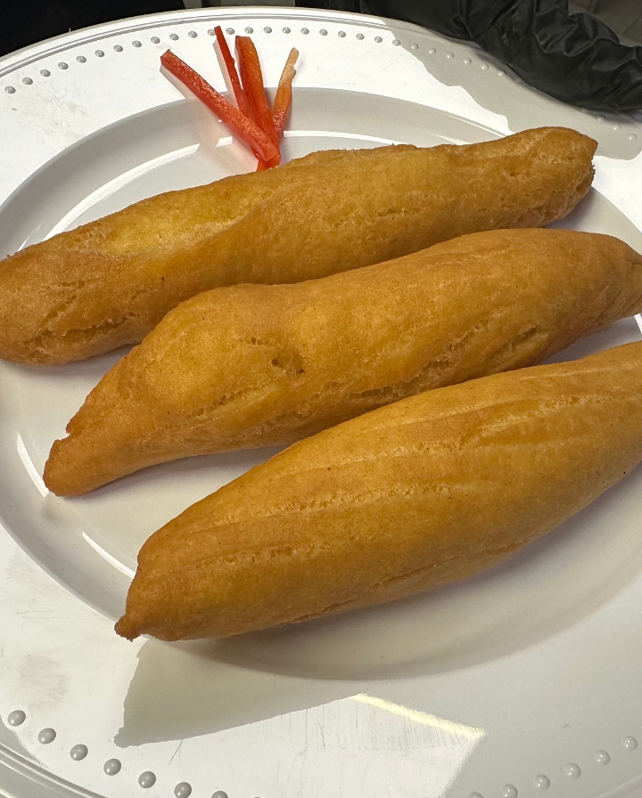 Festival (3) Flour, cornmeal, sugar, spices, vanilla made into a dough then portioned and fried to order.