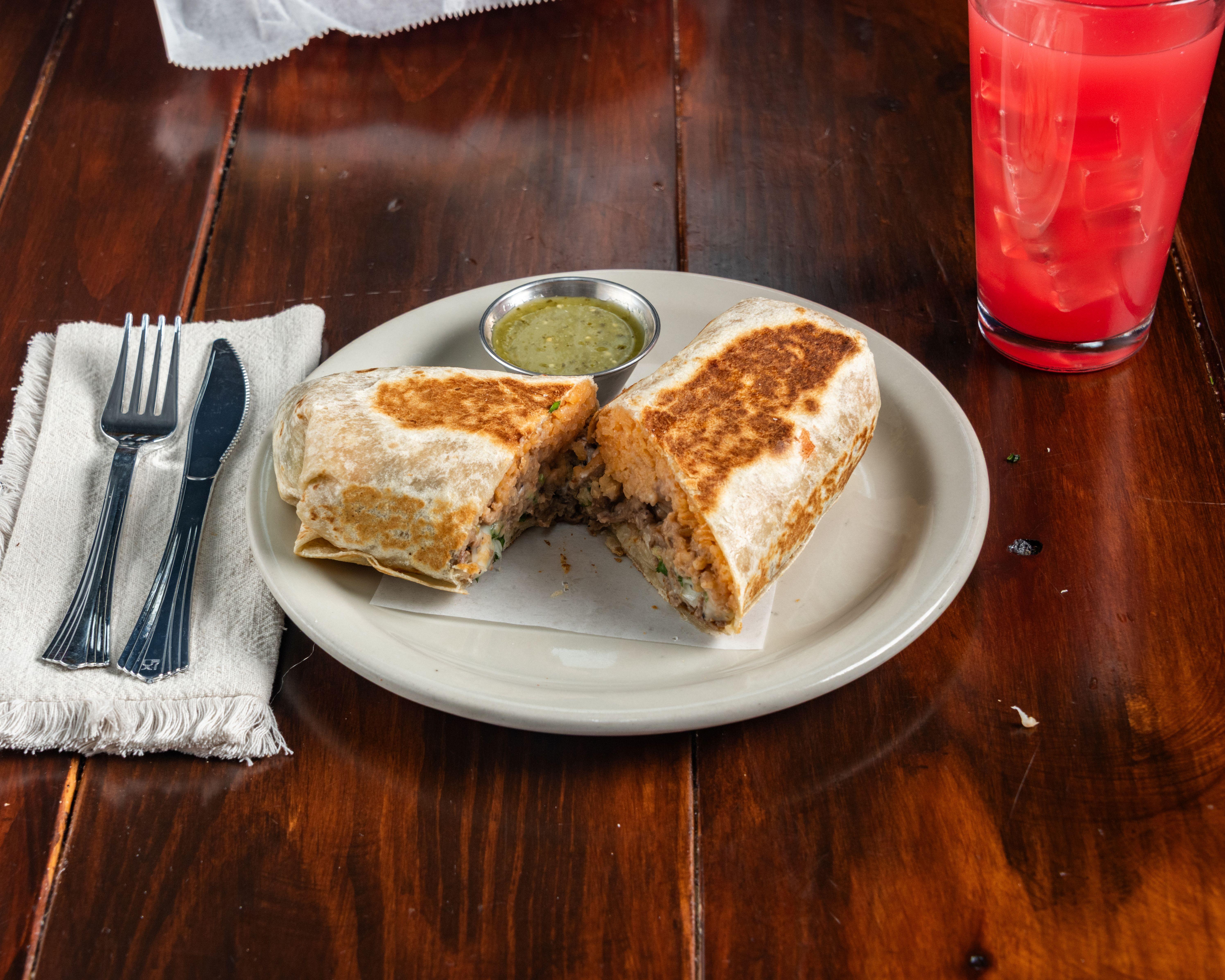 Breakfast Burrito with Eggs 1 Meat, Cheese and 1 Salsa Choice.