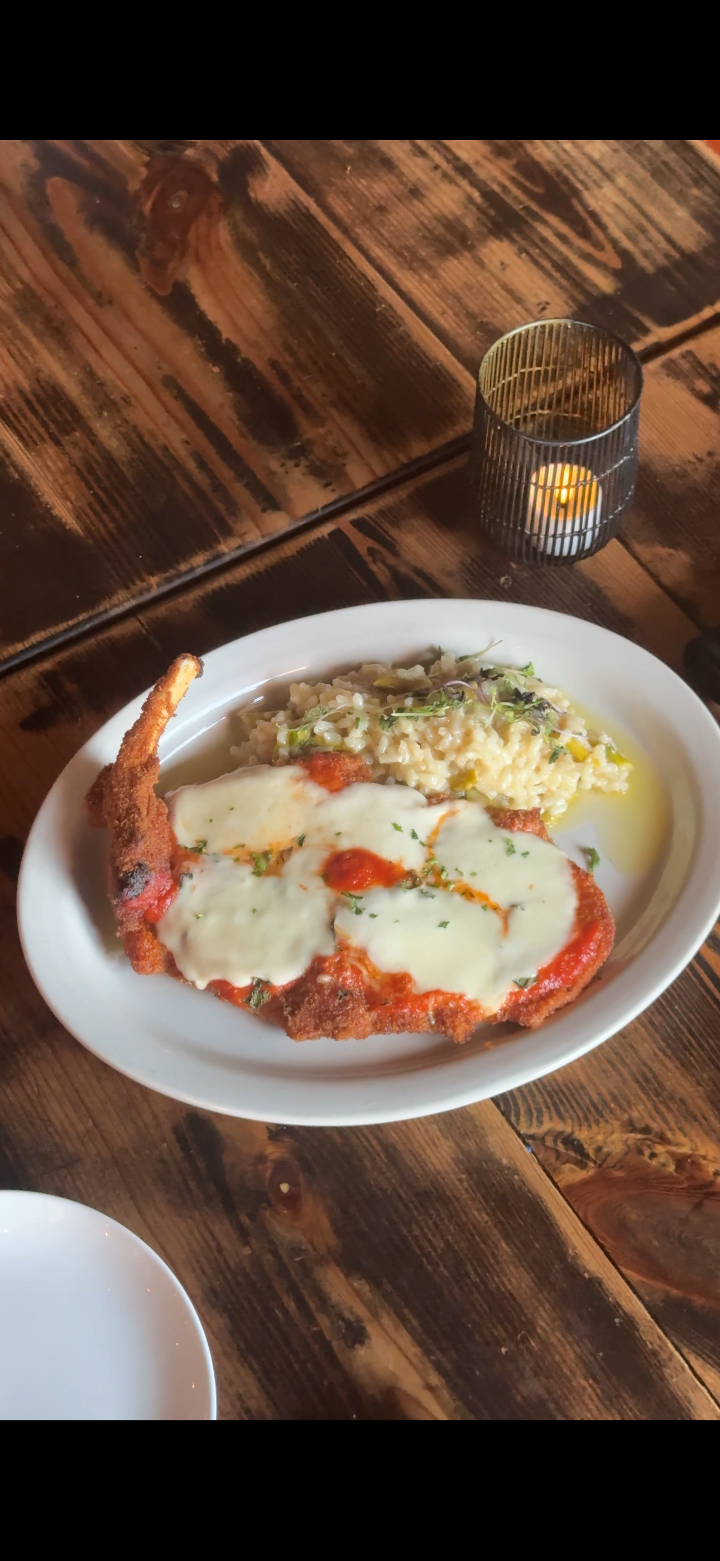 Pork Chop “Alla Parmigiana”.