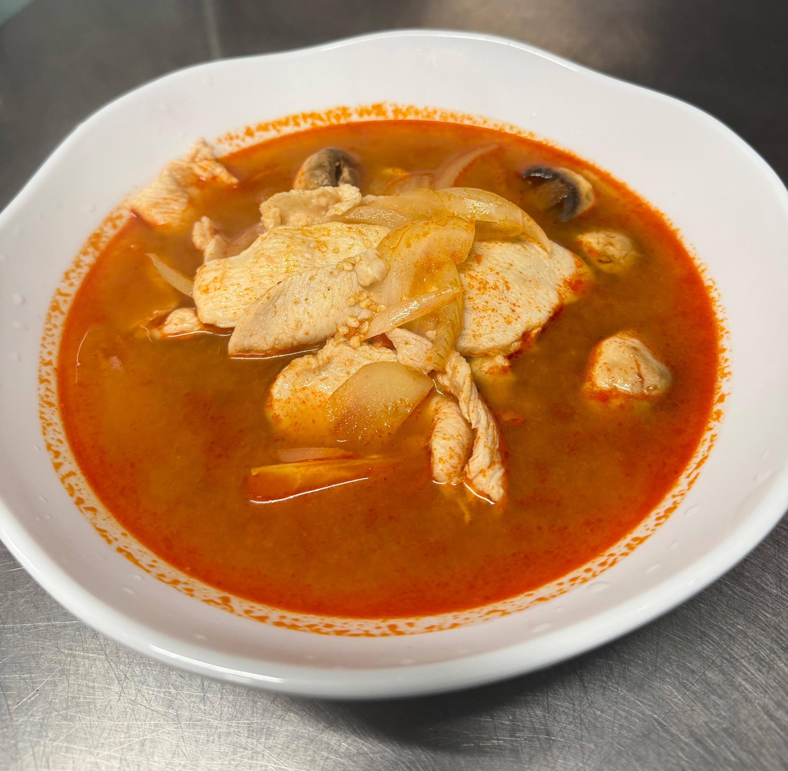 Tom Yum (Chicken/Shrimp) Served with Jasmine Rice.