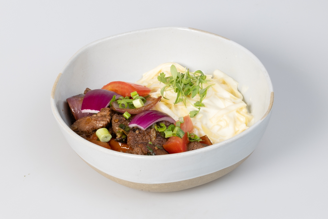 Sauteed-Tossed Noodles with lomo.