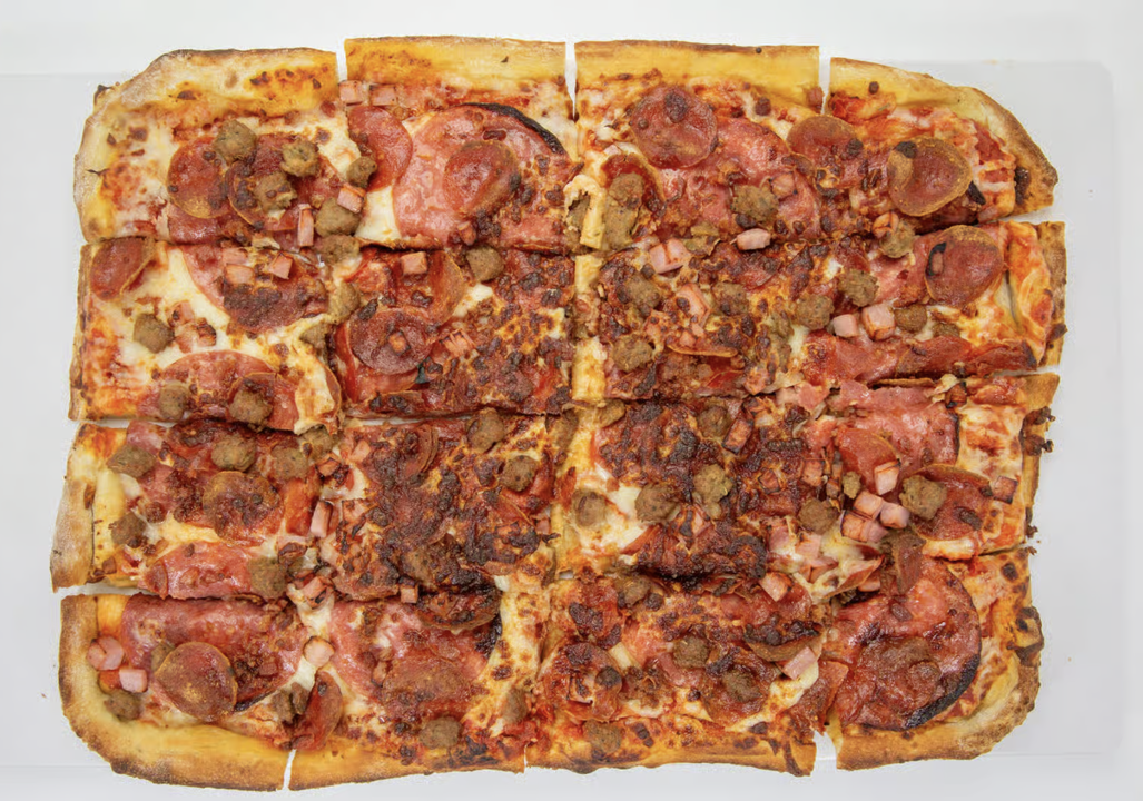 Half sheet Meat Market Pizza.