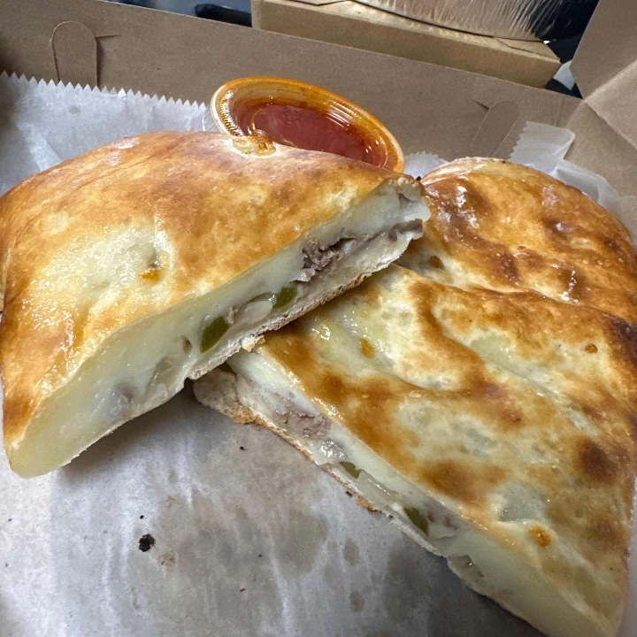 Personal Ribeye Steak with Onions & Peppers Stromboli.