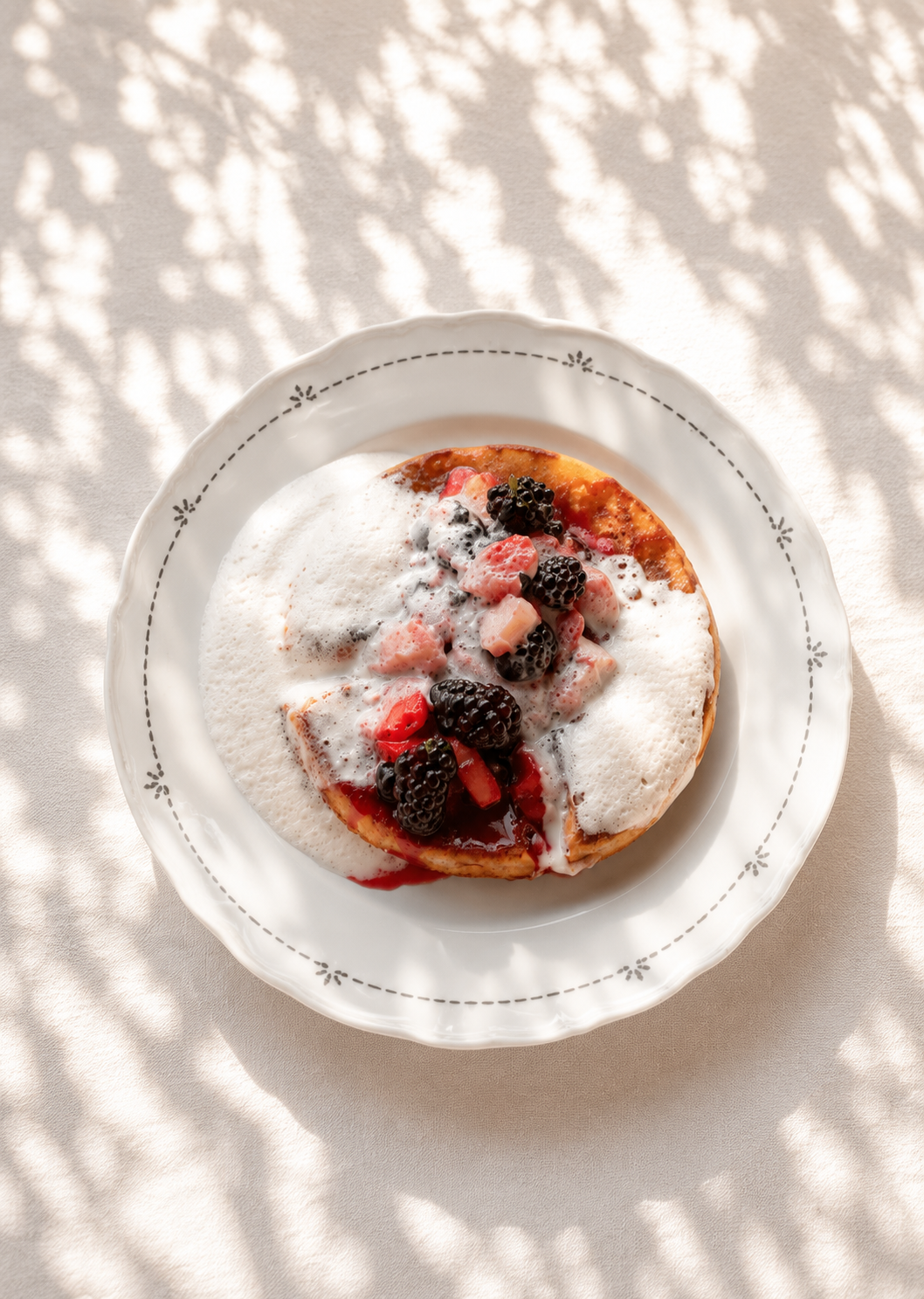 Waffle with Flambe Seasonal Fruits.