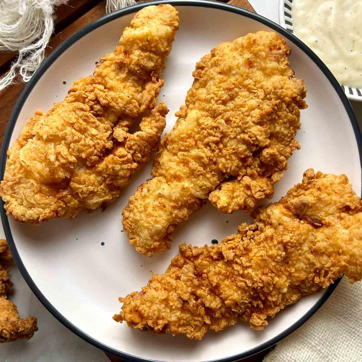 Kids 4 Piece Chicken Strips & Fries.