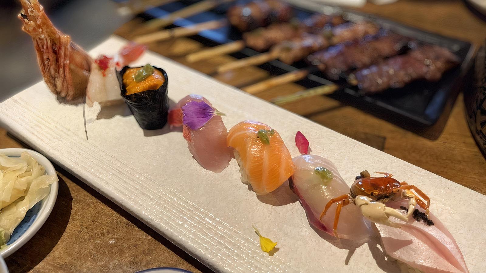 Sushi (10 pcs) and Sashimi (16 pcs) Omakase.