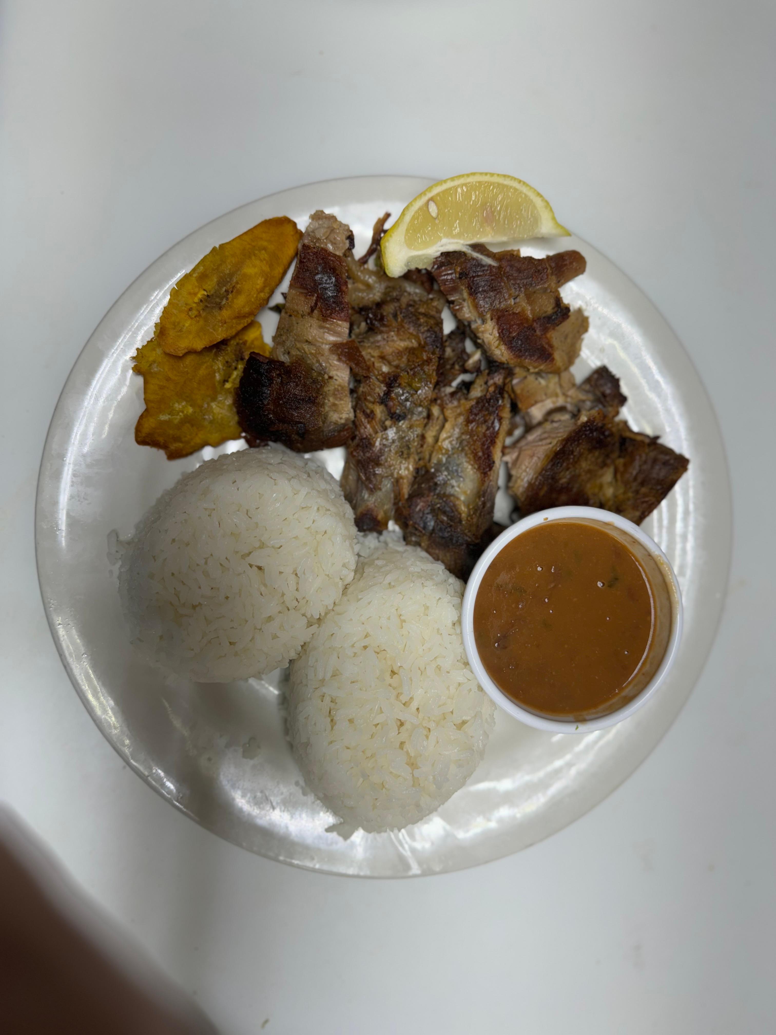 Pierna Cerdo Asada - Roasted Meat Pork on the Oven.