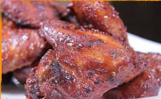 3 Jumbo Smoked Chicken Wings or jumbo smoked legs with 2 Regular Sides.