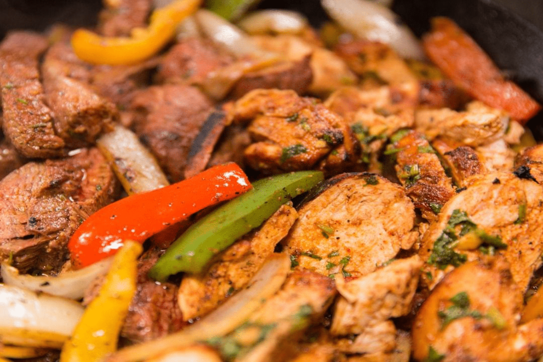 Steak & CHICKEN Fajitas.