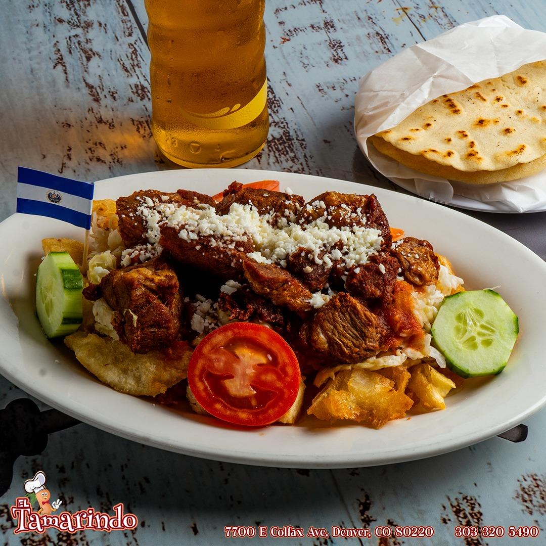 Yuca Con Chicharron/ Fried Yucca with Fried Tender Pork.
