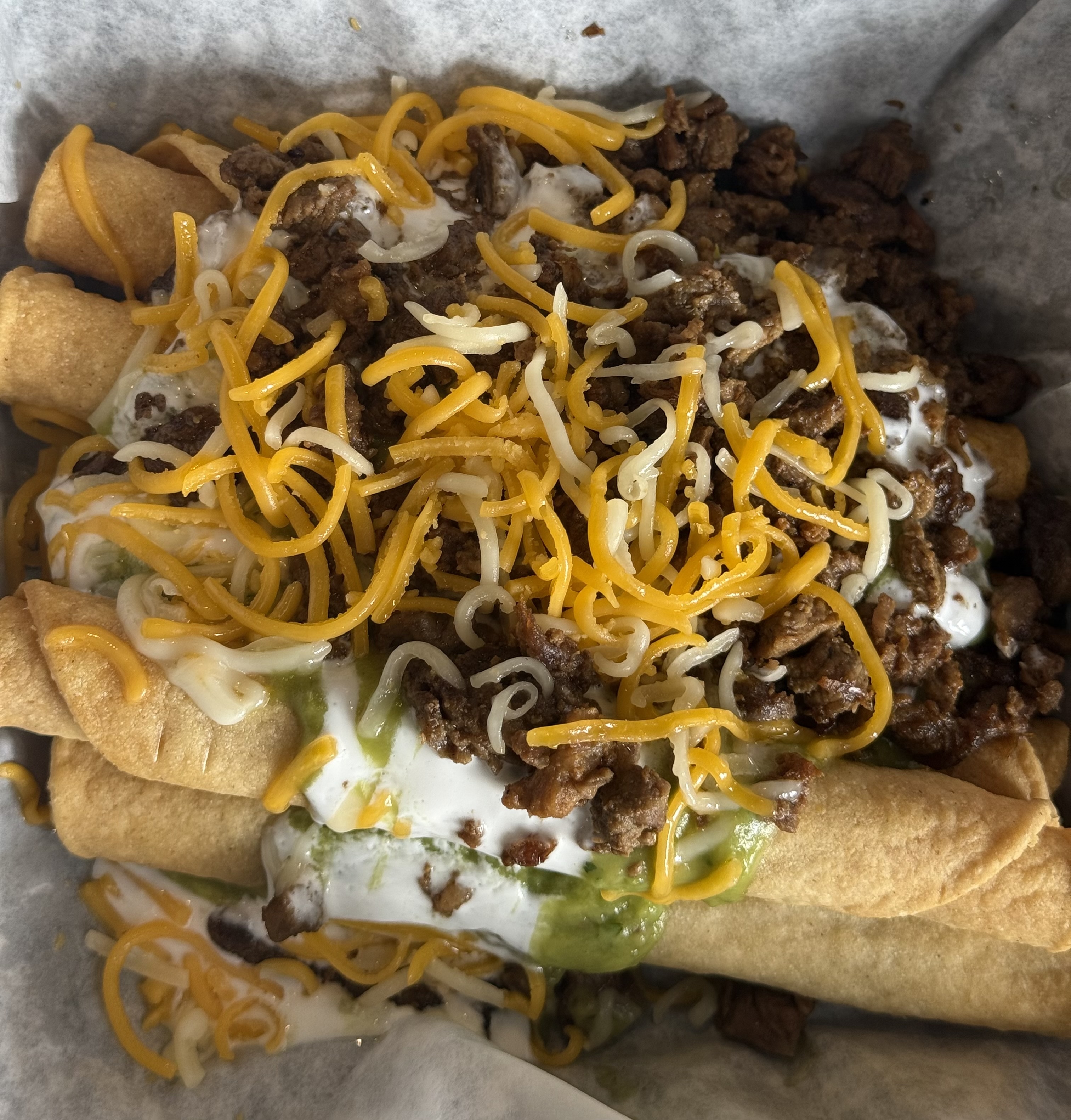 5 Rolled Tacos with Carne Asada.