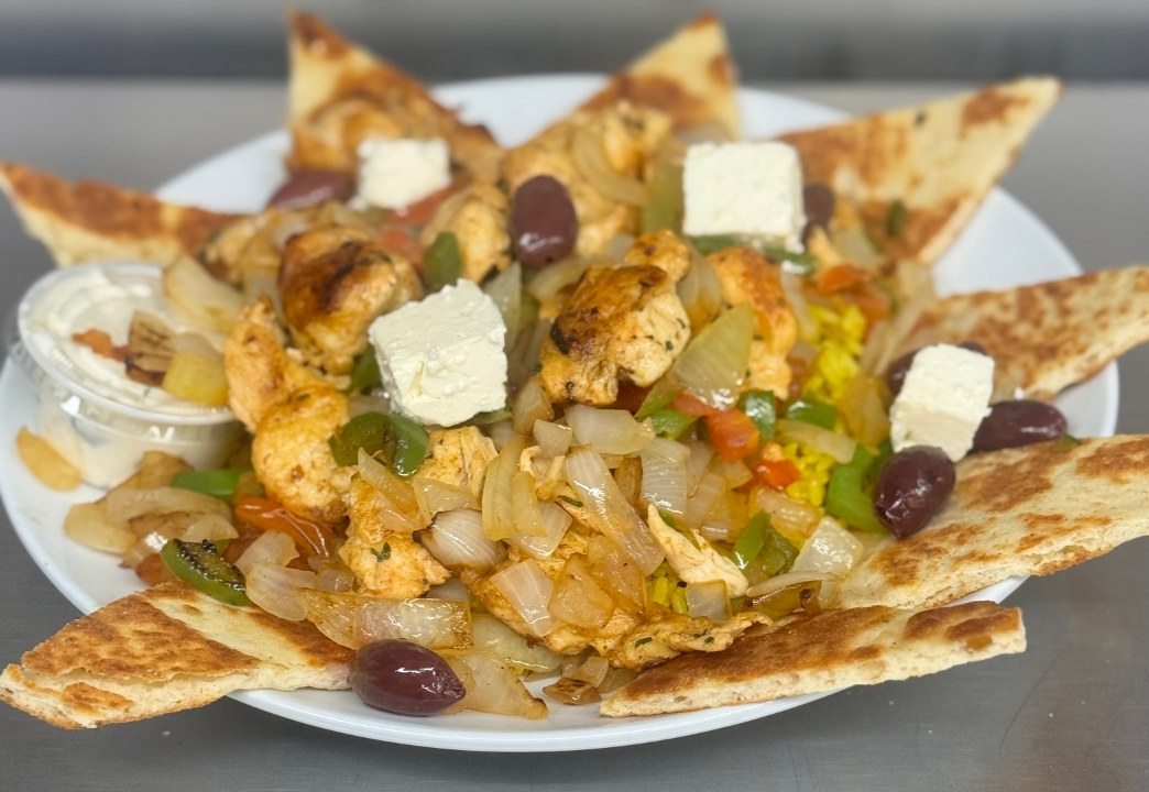 Chicken Souvlaki Over Rice.
