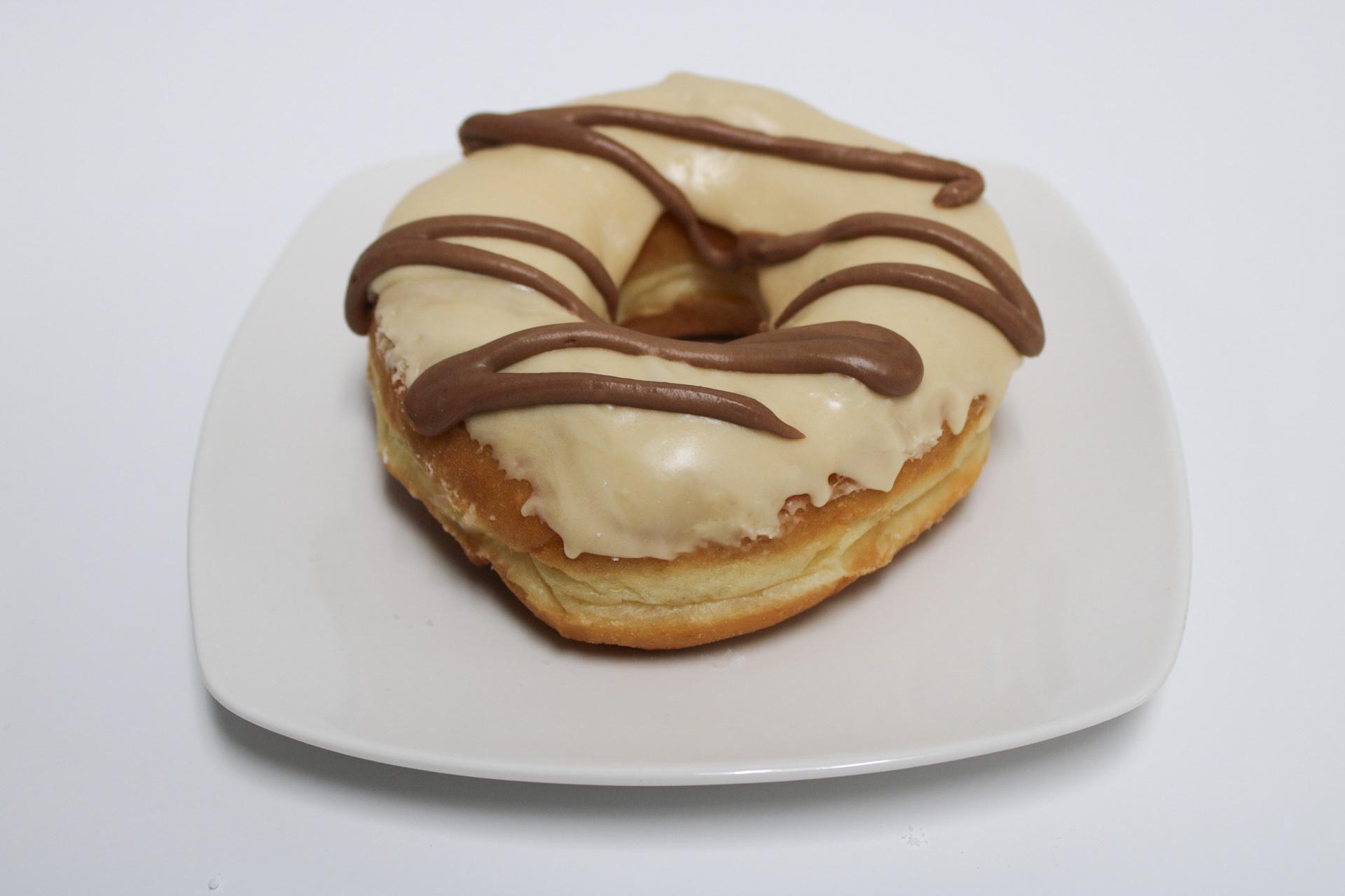 Caramel Icing W/ Chocolate Drizzle.