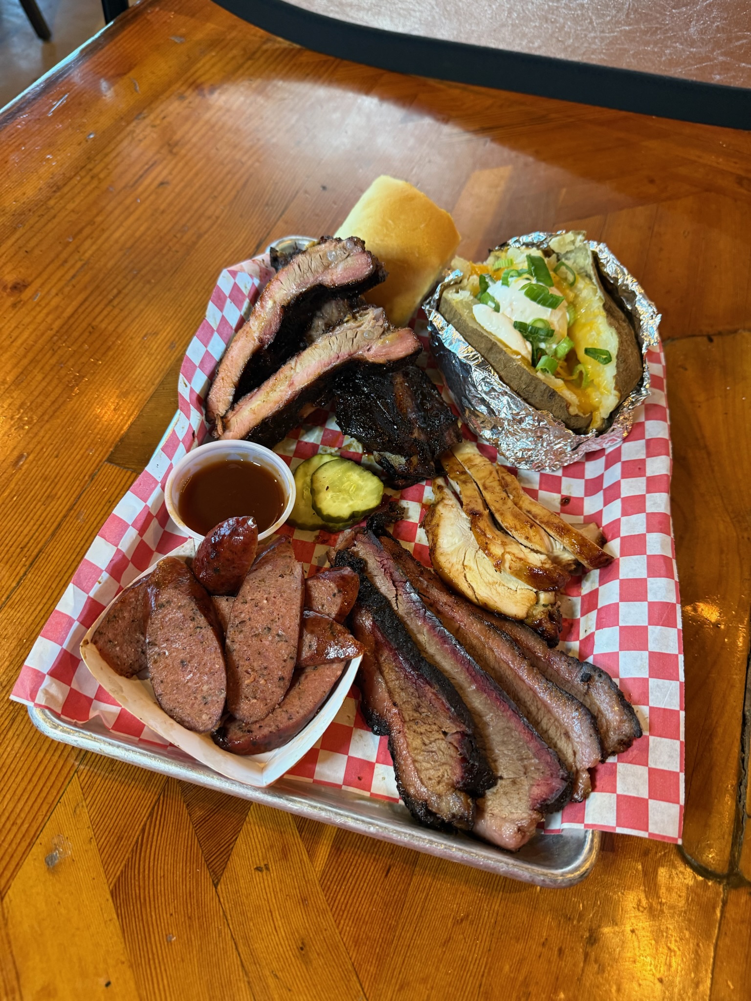 Meat Lovers Dinner with Overstuffed Potato.