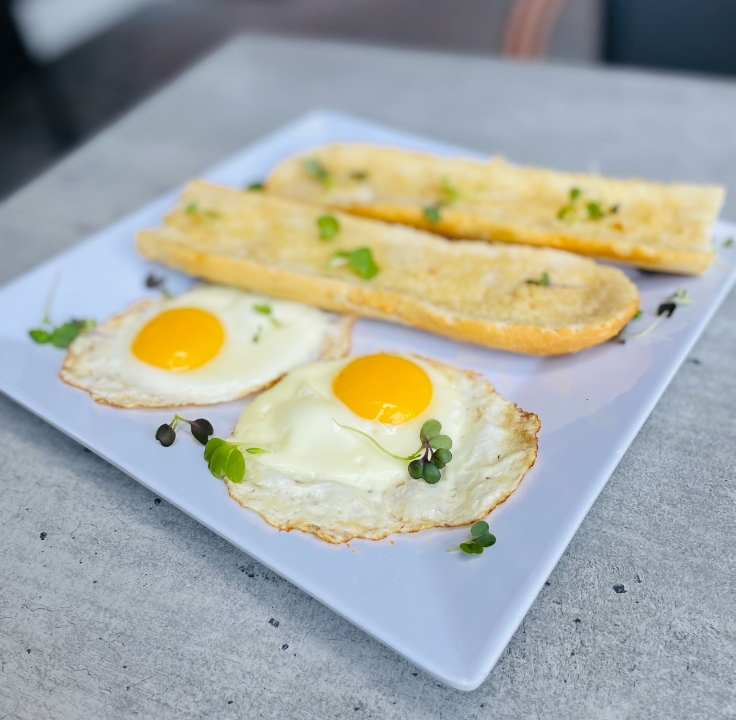 #60A 2 Eggs And Tostada.