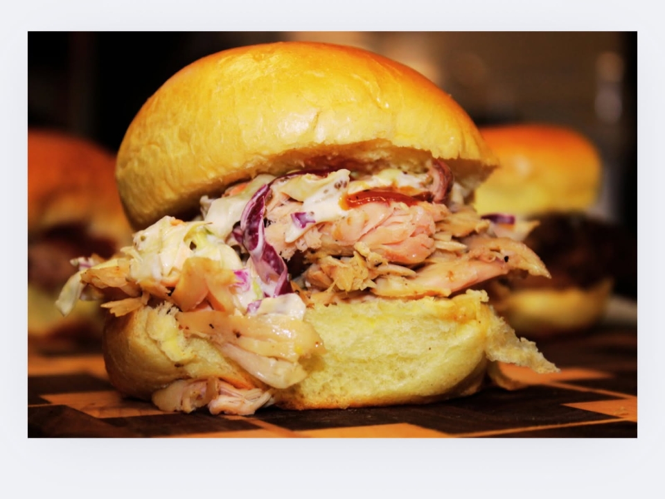 2 Pulled Chicken Sliders or Tacos with Small Side.