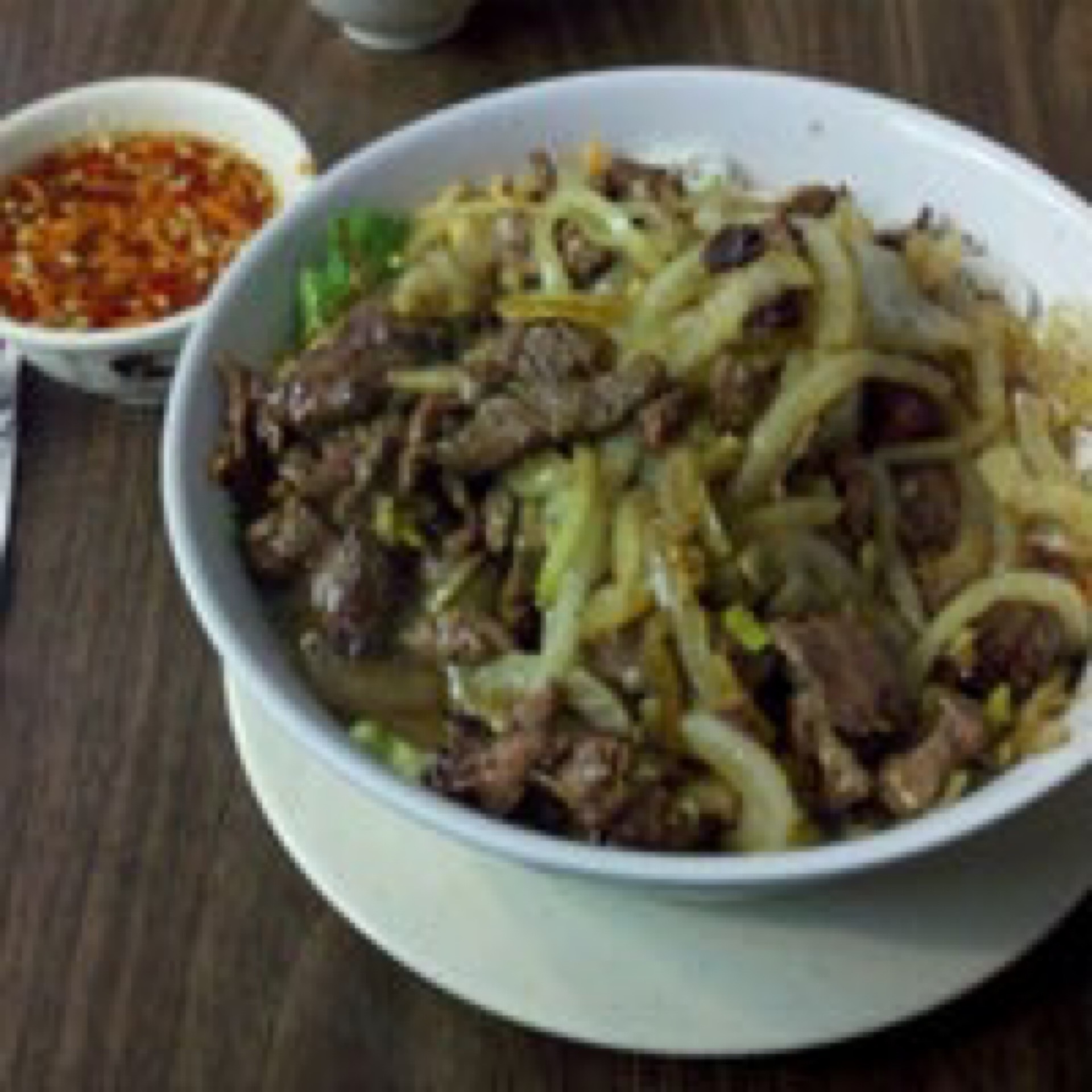 18. Beef sauteed over vermicelli - bún bò xào.