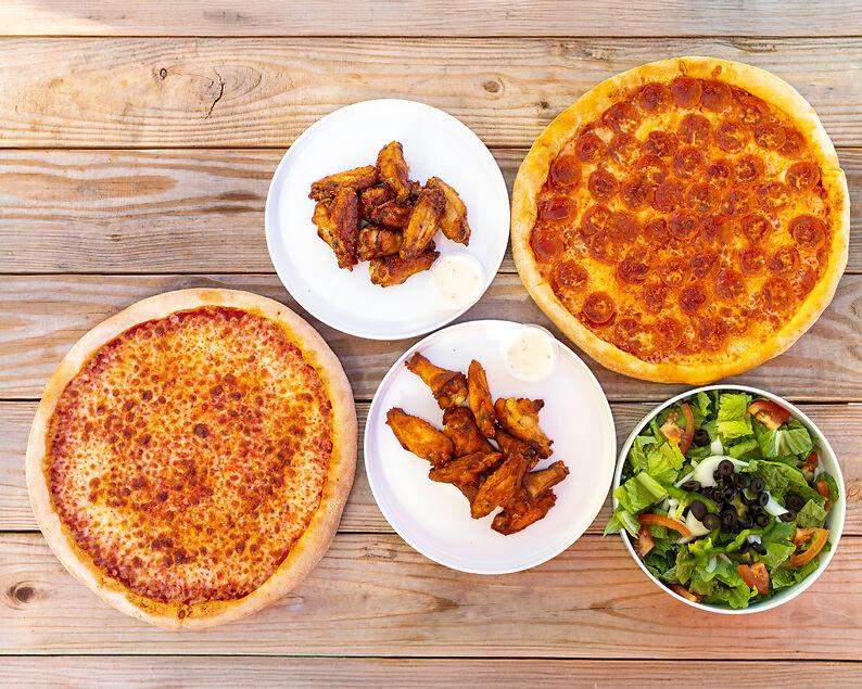 Two Large one topping pizzas, a large salad, & 20 Oven-baked Chicken Wings.