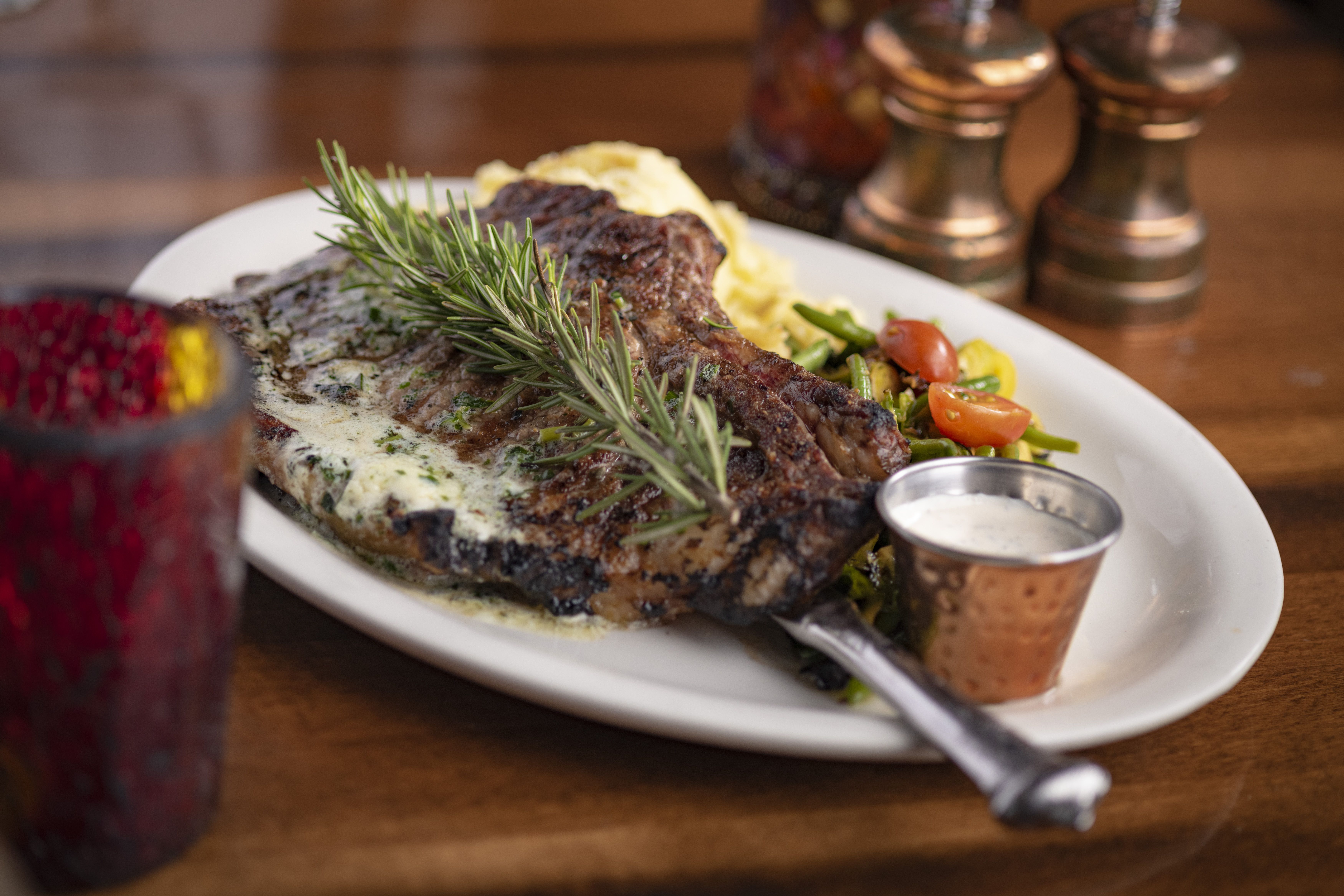 Grilled Harris Ranch 22oz Natural Bone-In Ribeye Steak.