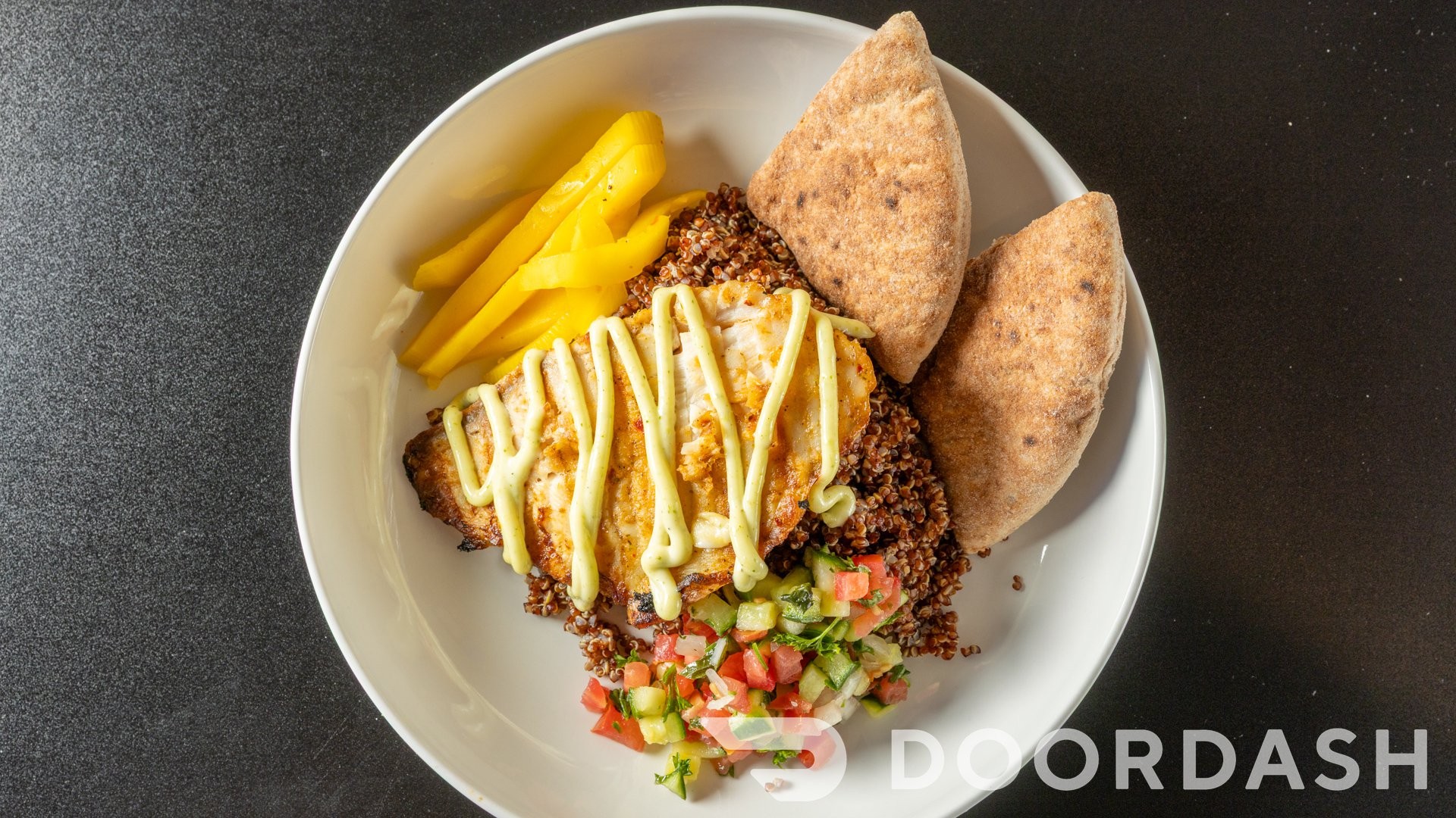 Citrus Grilled Fish Entree, Zhug Mayonnaise, Israeli Salad, Pickled Mango, 1/2 Pita.