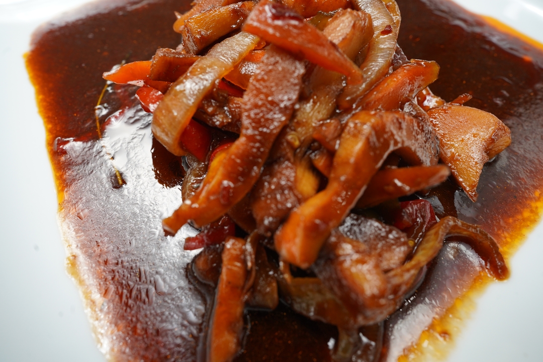 Brown Stewed Conch.