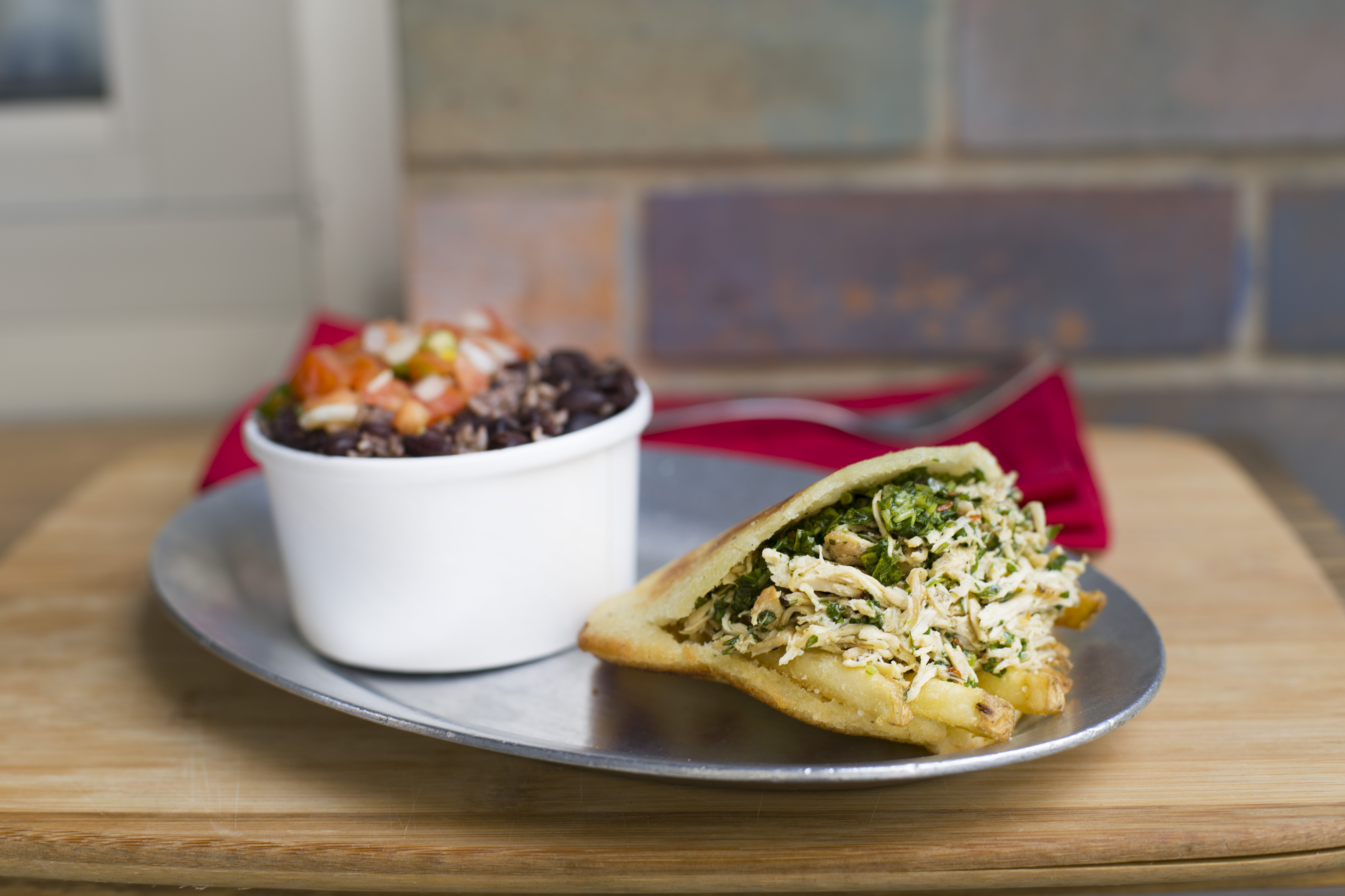 #1- 1 Arepa + soup, side, or drink.