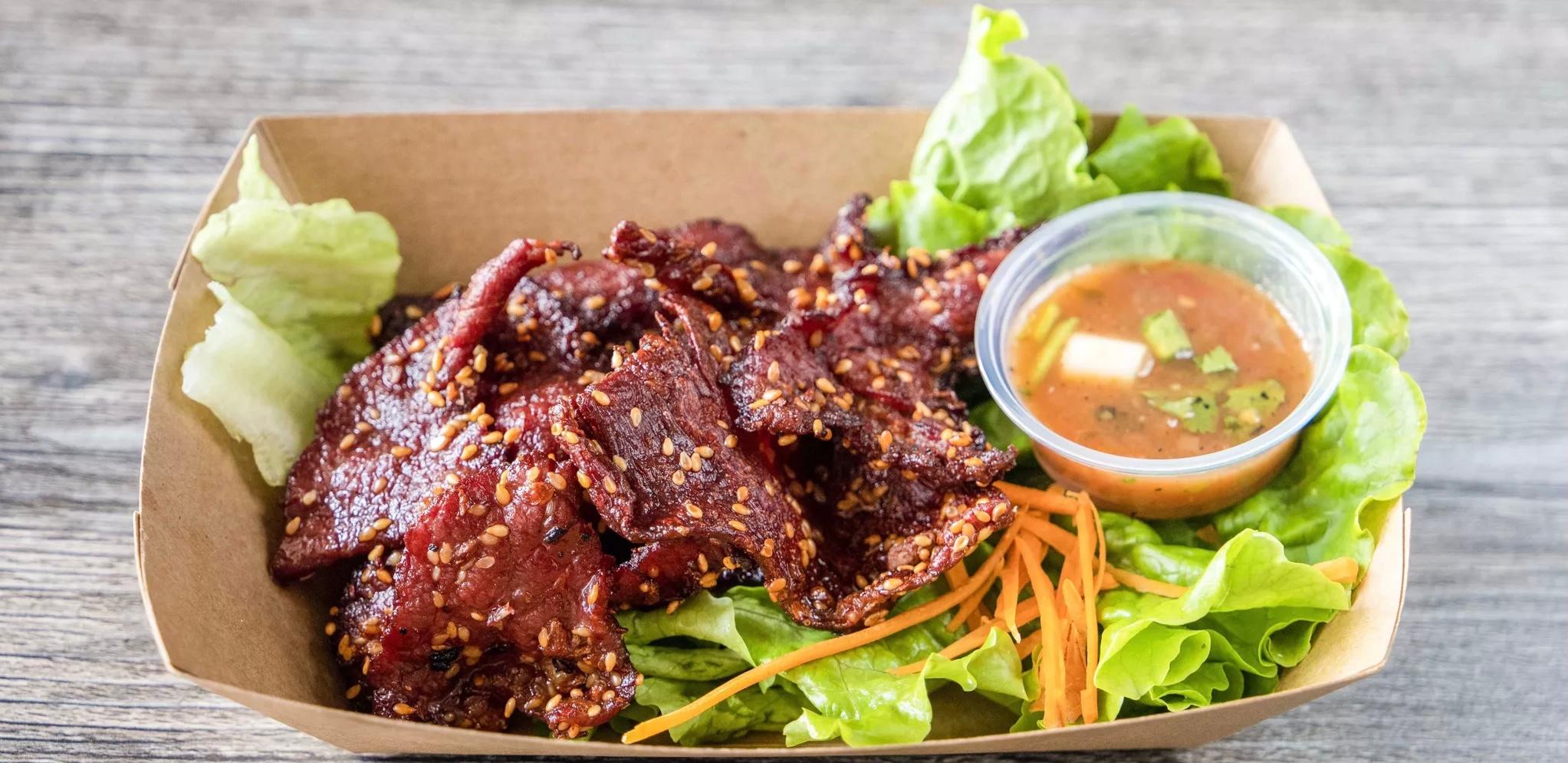 Hevenly jerky ( seen savanh)W/sticky rice.