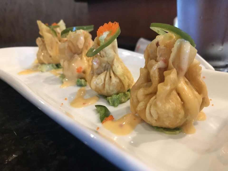 Spicy Lobster Dumpling** 🌶️🦞.