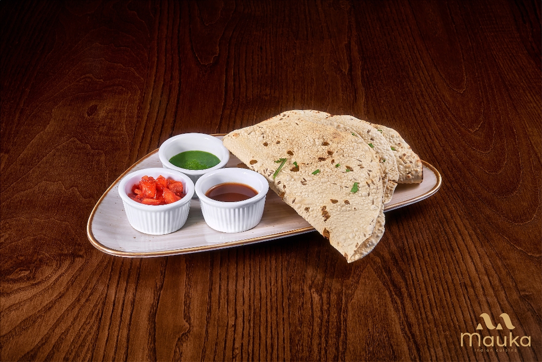 Roasted Papadam with Chutney Trio.