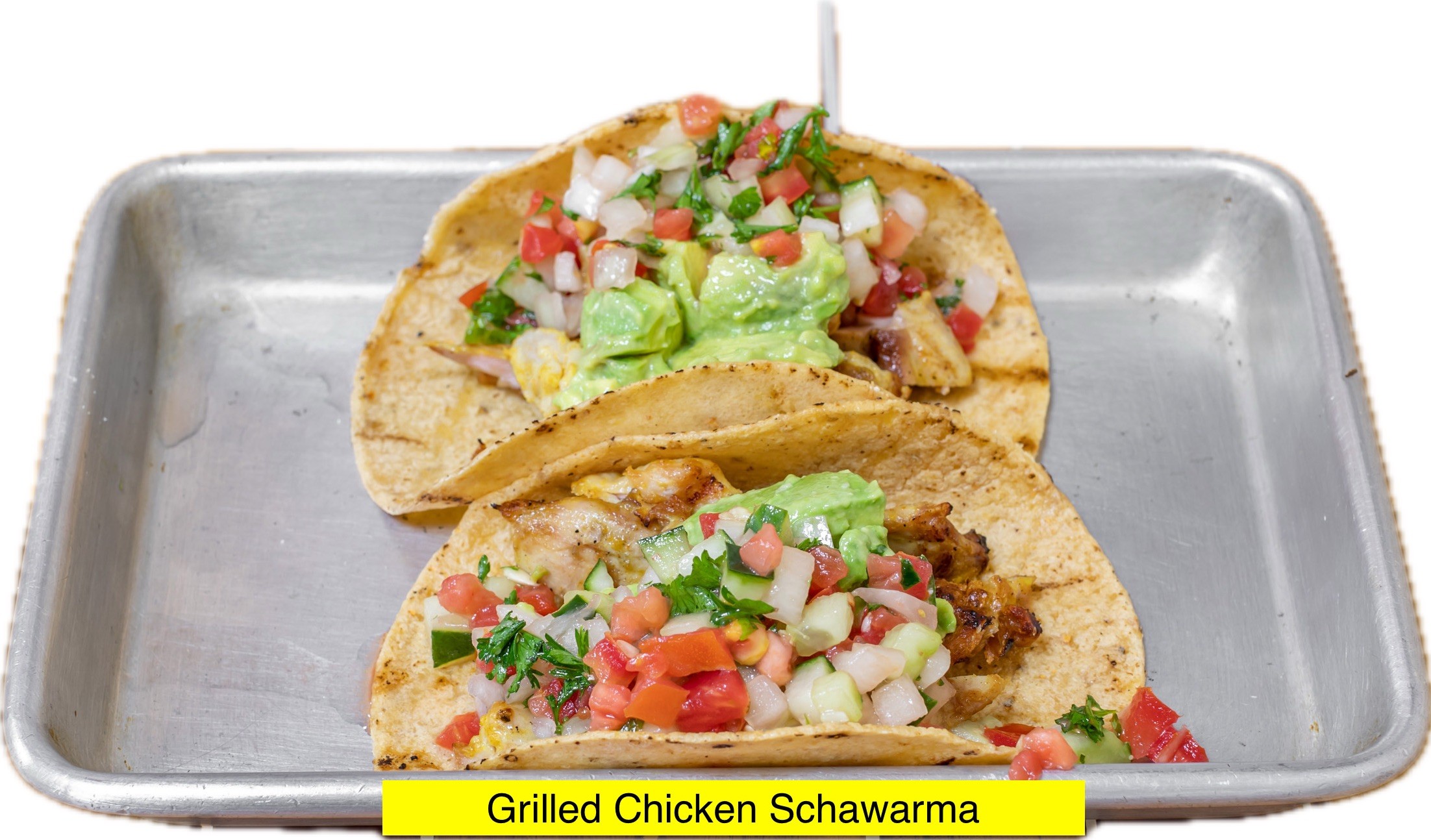 Grilled Chicken Shawarma Tacos, Avocado Hummus, Israeli Salad, Tahini.