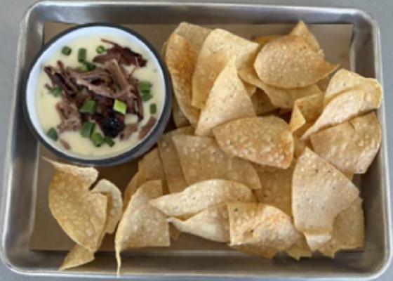 SMOKED BRISKET QUESO.