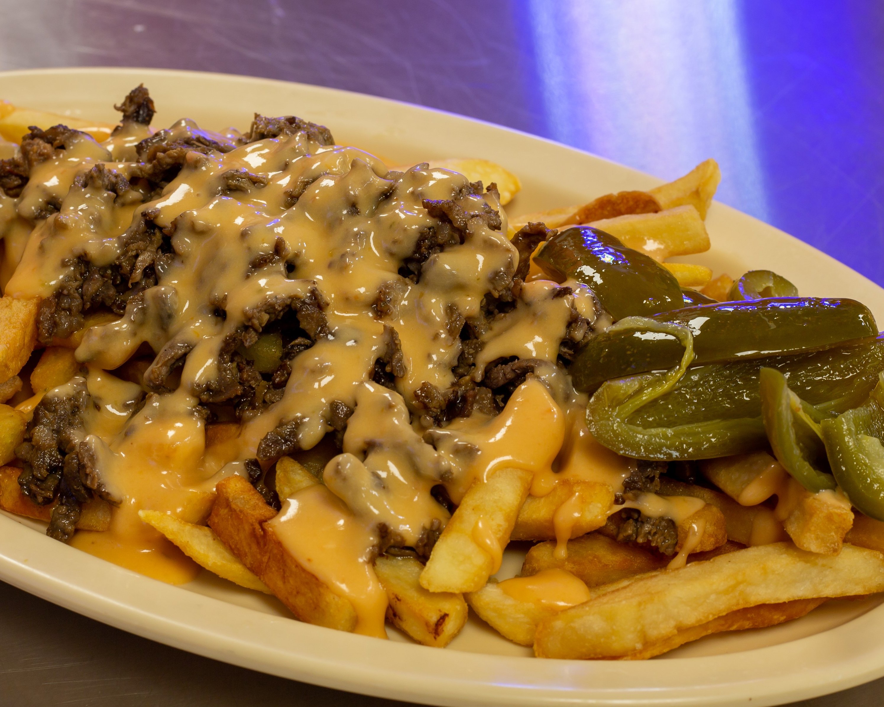 STEAK & CHEESE FRIES.